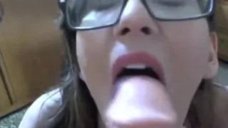 Dirty talked girl with glasses deepthroats dildo