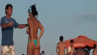 Bouncing breasts on the beach