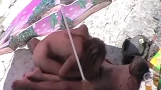 Giving head on the beach