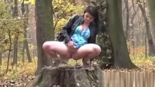 Blonde on heels pissing behind cars in public