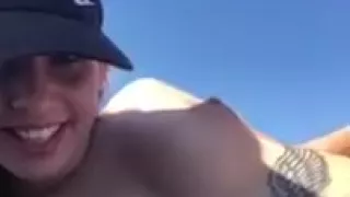 cute teen sunbathing with no bra