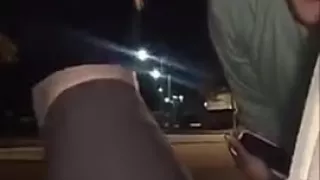 sexy girl in tight leggings twerking outside