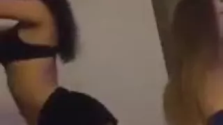 two russian girls having fun in a hotel room