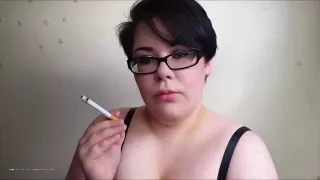 Chubby and freckled brunette Quinn Lane smokes for the camera