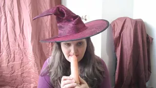 Halloween witch sucking a dildo