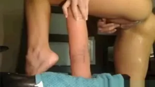 Whore Riding A Huge Dildo