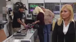 Pawnshop milf cocksucks out the back for cash