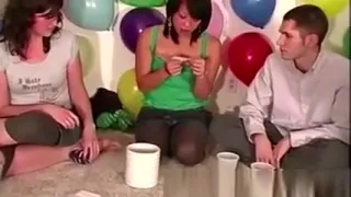 Lesbian play in party game for group of amateurs