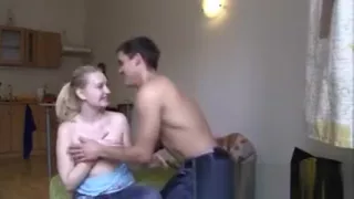 Petite blonde teen shows off her tits