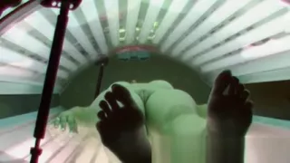 Sexy Tattoed Blonde in Solarium