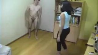 Carol practice her kung fu by kicking and kneeing him in th