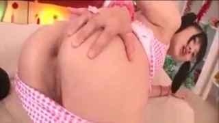 Ponytailed jap sex doll gets ass fingered for the first time