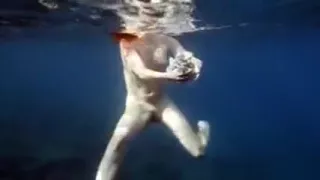 Nastya swimming nude in the sea