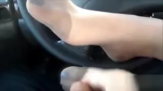 Teasing Her Feet In Pantyhose In A Car