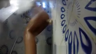 Amazing milf uses the wall dildo on the shower