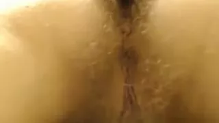 Hot amateur babe showing her hairy pussy on web cam