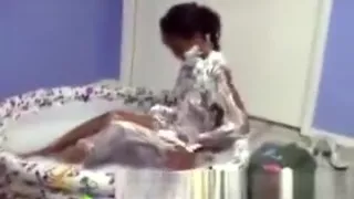 Perv tapes ebony girlfriend getting soapy in a bathtub