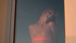 Sasha in little pink panties flashing small tits by the