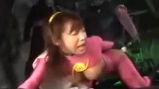 Bodacious Oriental girl in a pink outfit gets drilled by a