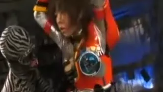 He has her tied up and uses toys and hands to show her boob