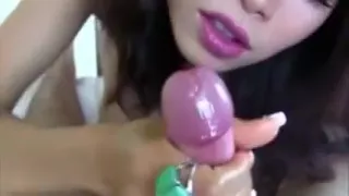 Asian Beauty giving an unforgettable handjob