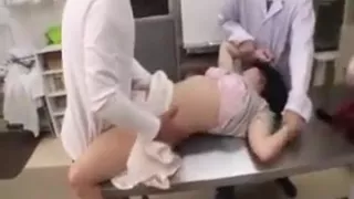 Young Asian cutie is held down on a metal table and gets he