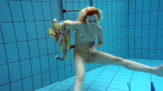 Blonde In A Dress In A Pool