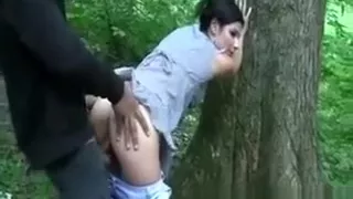 Whore Gets A Cock Rammed Up Her Pussy Against Tree