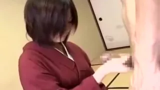 Attractive Oriental Wife Wraps Her Skillful Hands Around A