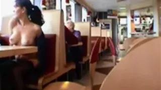 Dark Haired Girl Flashing Boobs In Public Restaurant