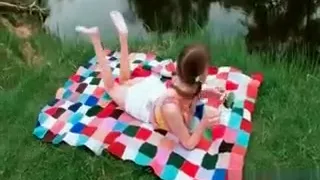 Turned on Beata teasing her pussy with a cucumber