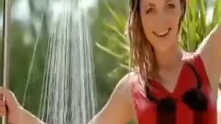 Seductive teen babe teases under shower