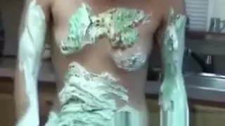 Asian teen covers herself in cereal