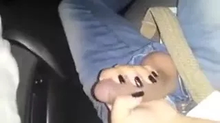 Gives handjob to a big cock