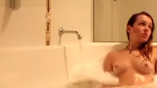 Brunette Beauty Taking A Shower