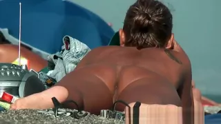 Sexy nudist babes filmed playing on the nude beach