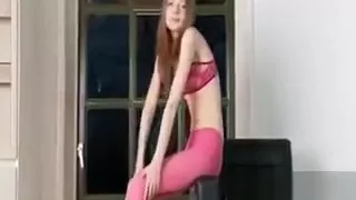 Teen blonde streaches her hot body