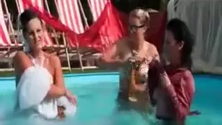 Party tramps show wet tits in the pool