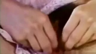 Busty retro babe masturbates in bed