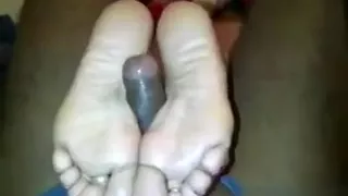 Mature Latina Stroking Dick With Her Feet