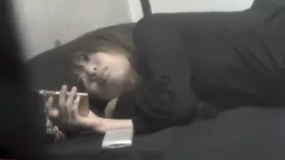 Asian babe rubs her pussy