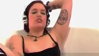 Tattooed redhead beauty shows her nastiest side in camera