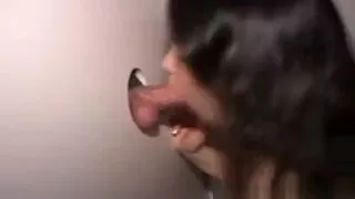 Brunette Taking Cumshot On Great Big Tits Through Glory Hole