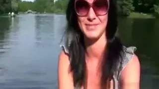 Pretty chick goes on small boat with two dudes in park