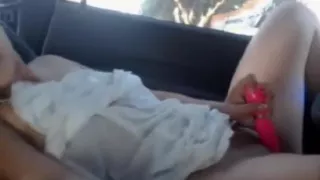 Woman masturbates while in the vehicle in public places