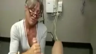 Her mature hands will do the trick for this horny guy