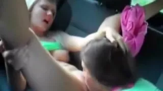 teen eats out her hot shaved girlfriend  in the car