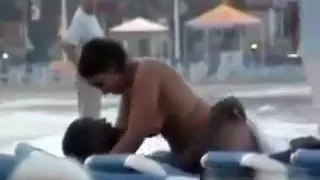 Interracial Couple Having Sex At The Beach