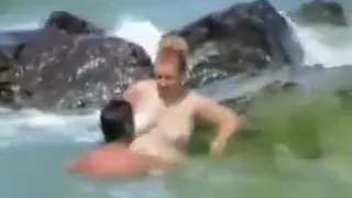 Couple Having Sex At The Sea