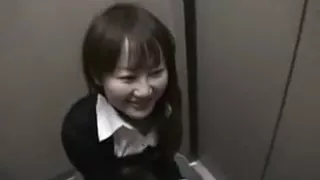 Attractive Japanese babe kneels down and milks a shaft with